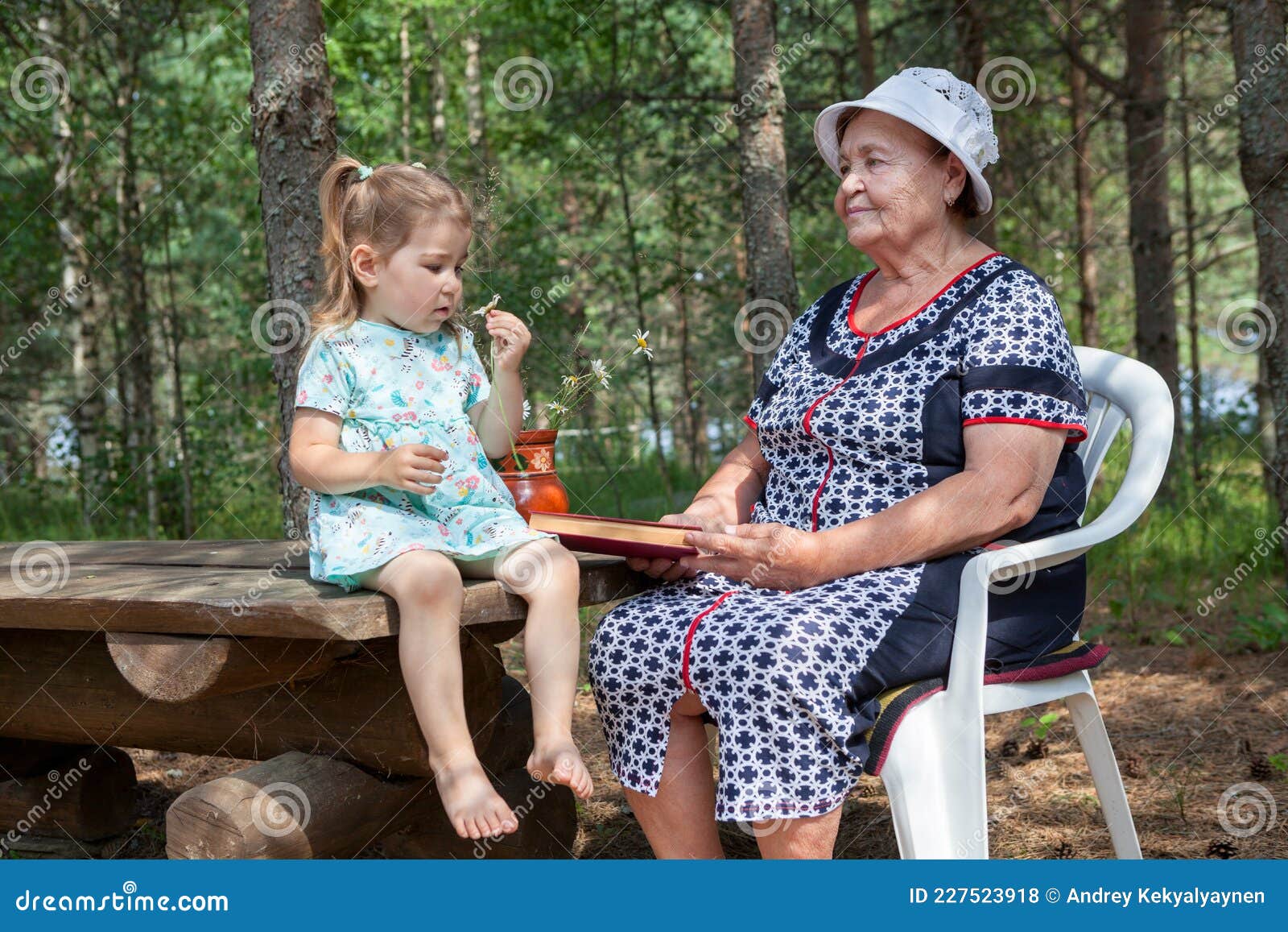 Senior Old Granny Woman Showing Thumbs Up And Pointing At Left On Blank