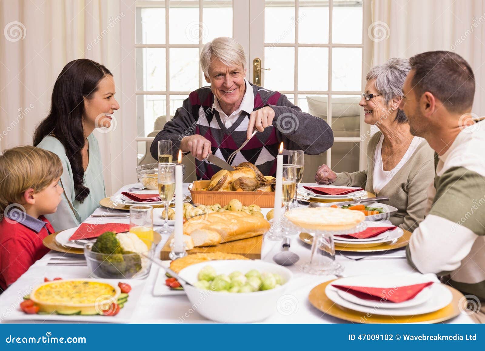 Grandfather Carving Chicken during Christmas Dinner Stock Photo - Image ...