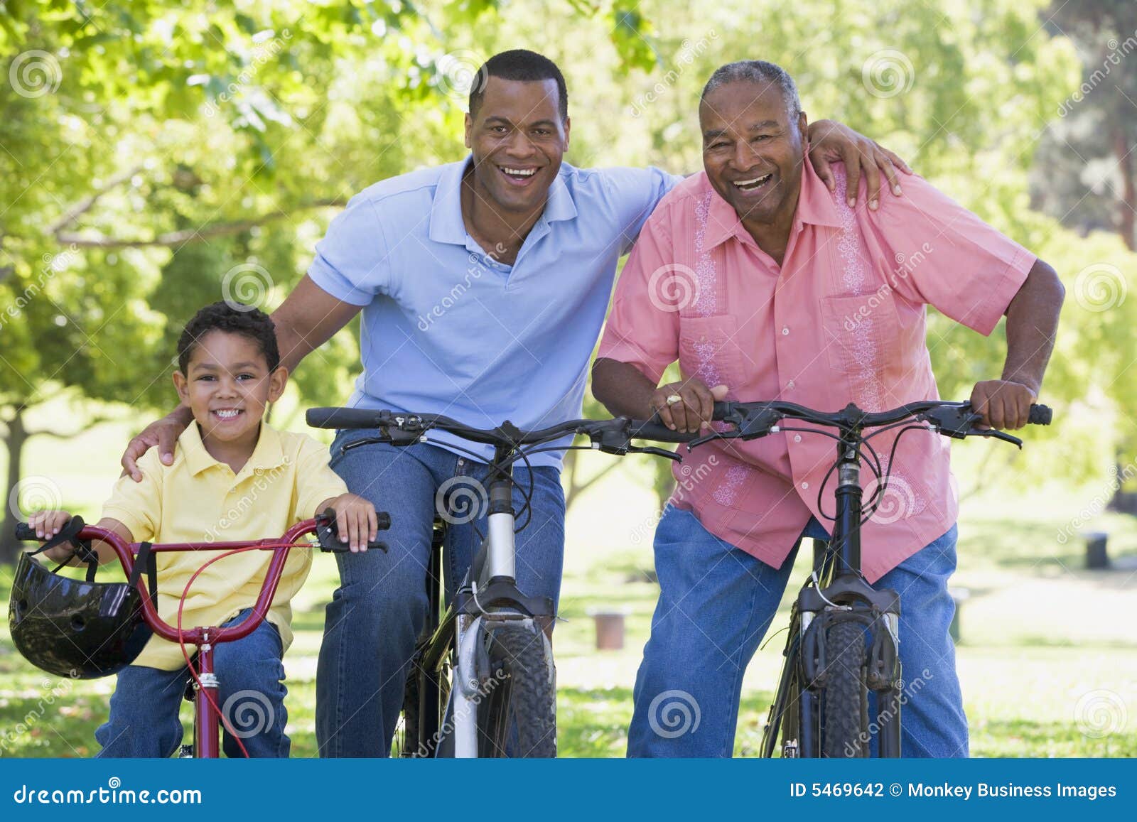 grandfather grandson and son bike riding