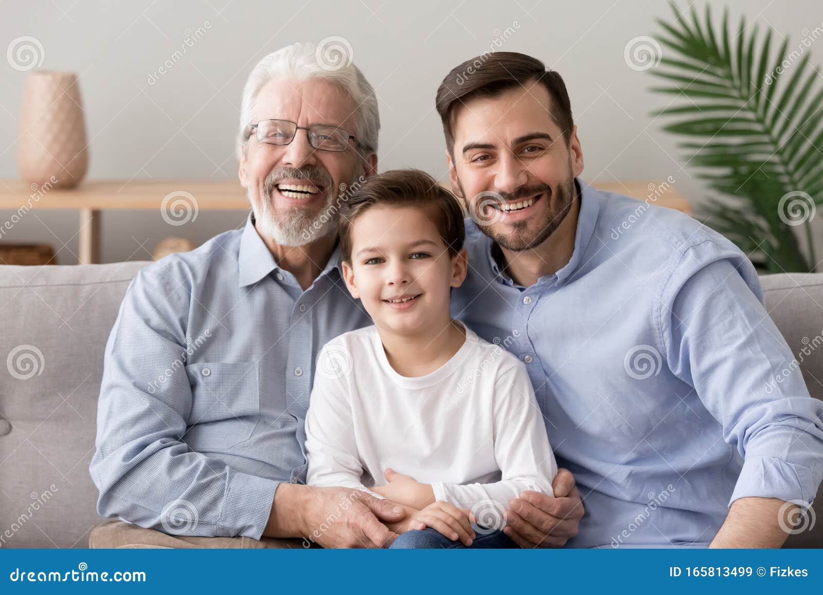 grandfather son and grandson multi generational family portrait