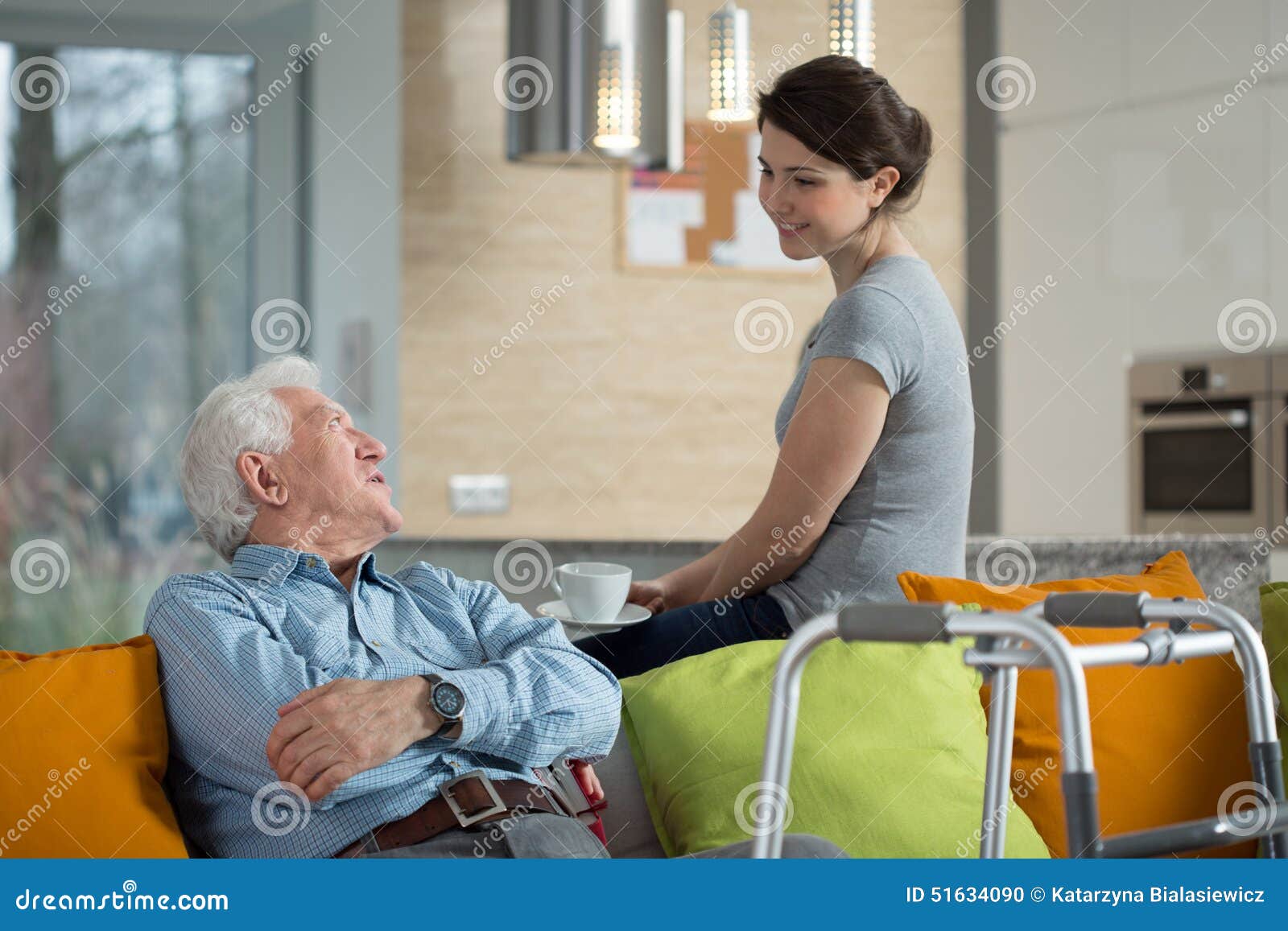 grandfather talking with loved granddaughter