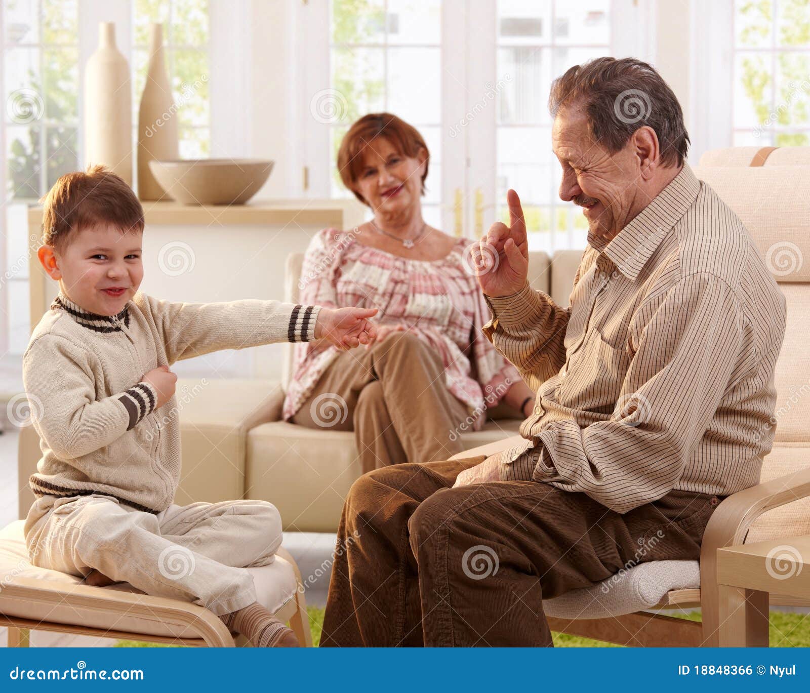 grandfather telling telling a story to grandson