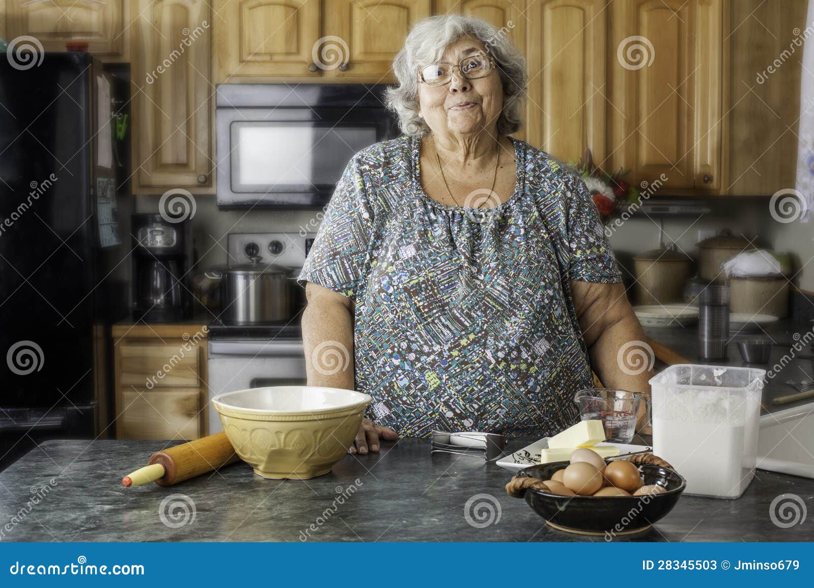 Grandma in a Kitchen Preparing To Bake Stock Image Image of casual