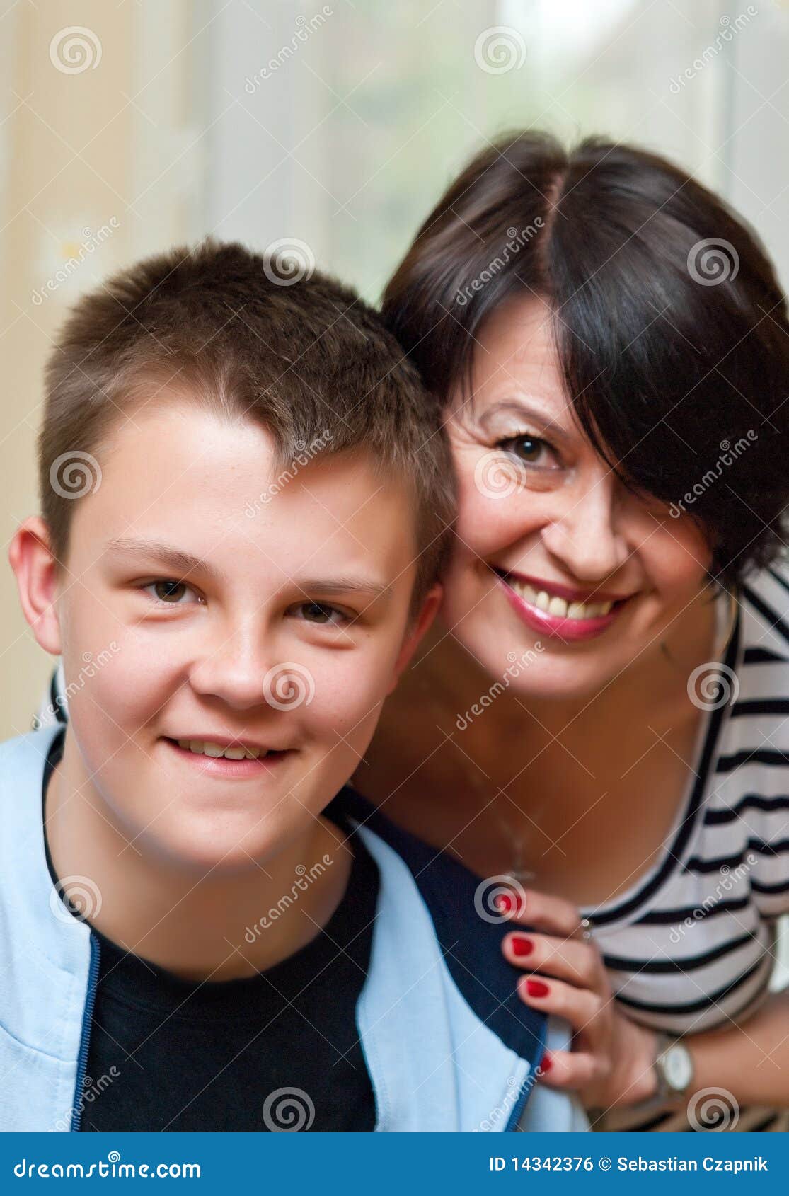 Mature Mother Loves Young Boy