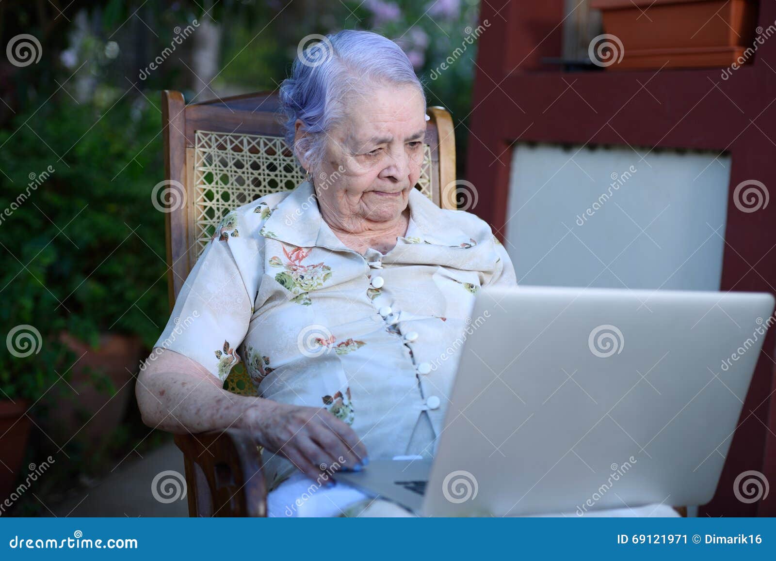 Grandma using a laptop stock image. Image of computer 69121971