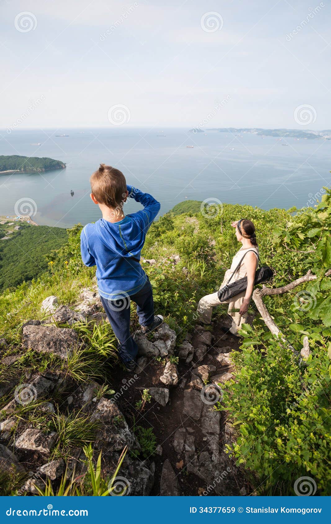 Grandmother and Grandson Come Down from the Mountain. Stock Image