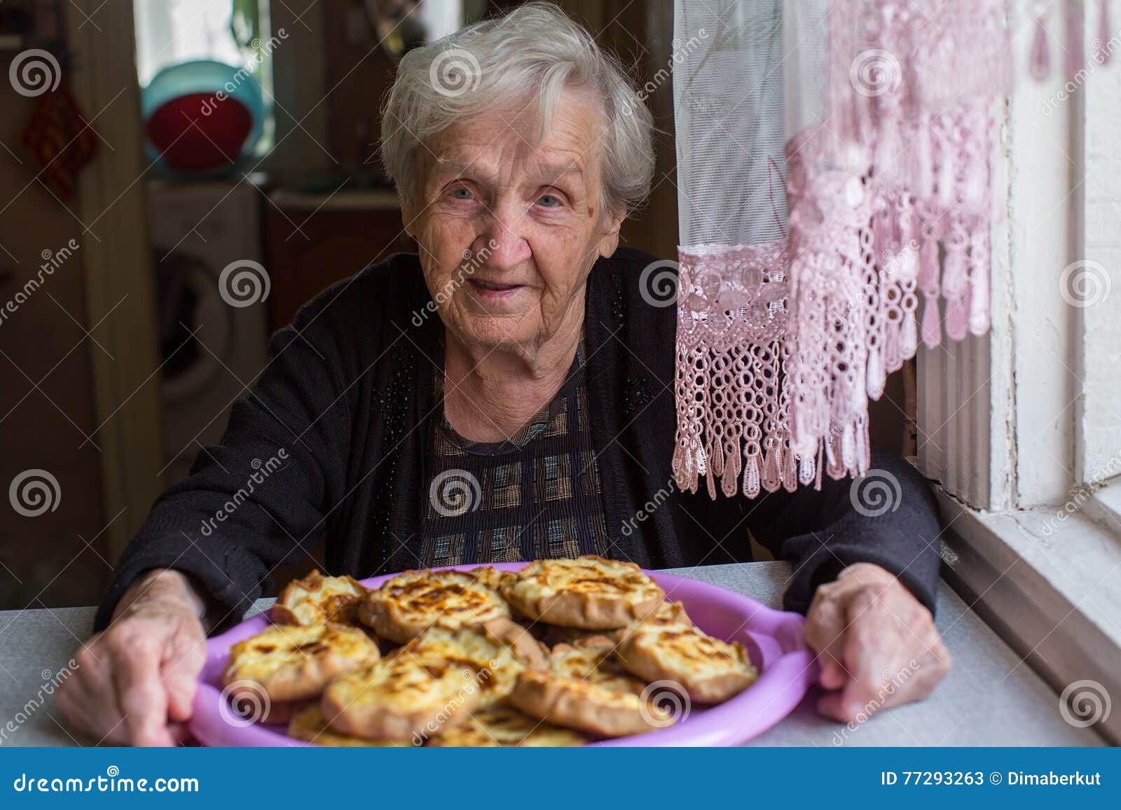 Grandmother with Pies in the Kitchen. Happy. Stock Image - Image of ...