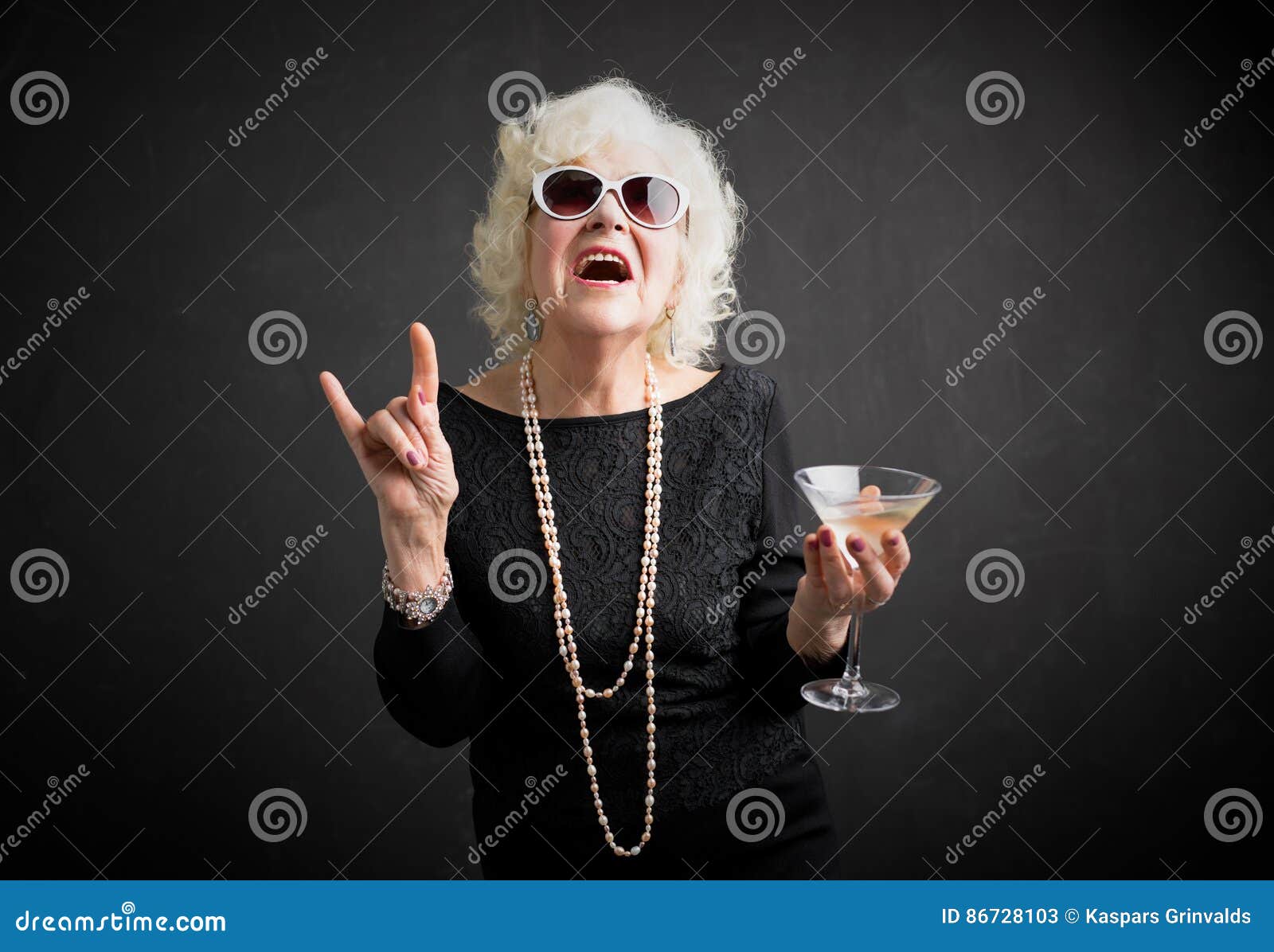 grandmother with sunglasses and drink in hand