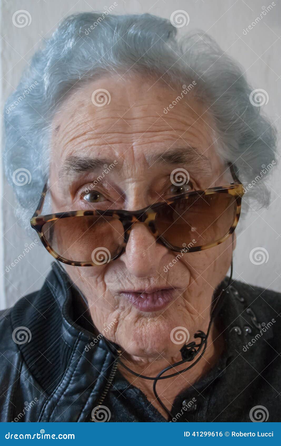 Grandmother with Sunglasses, Headphones and Leather Jacket Stock Photo ...
