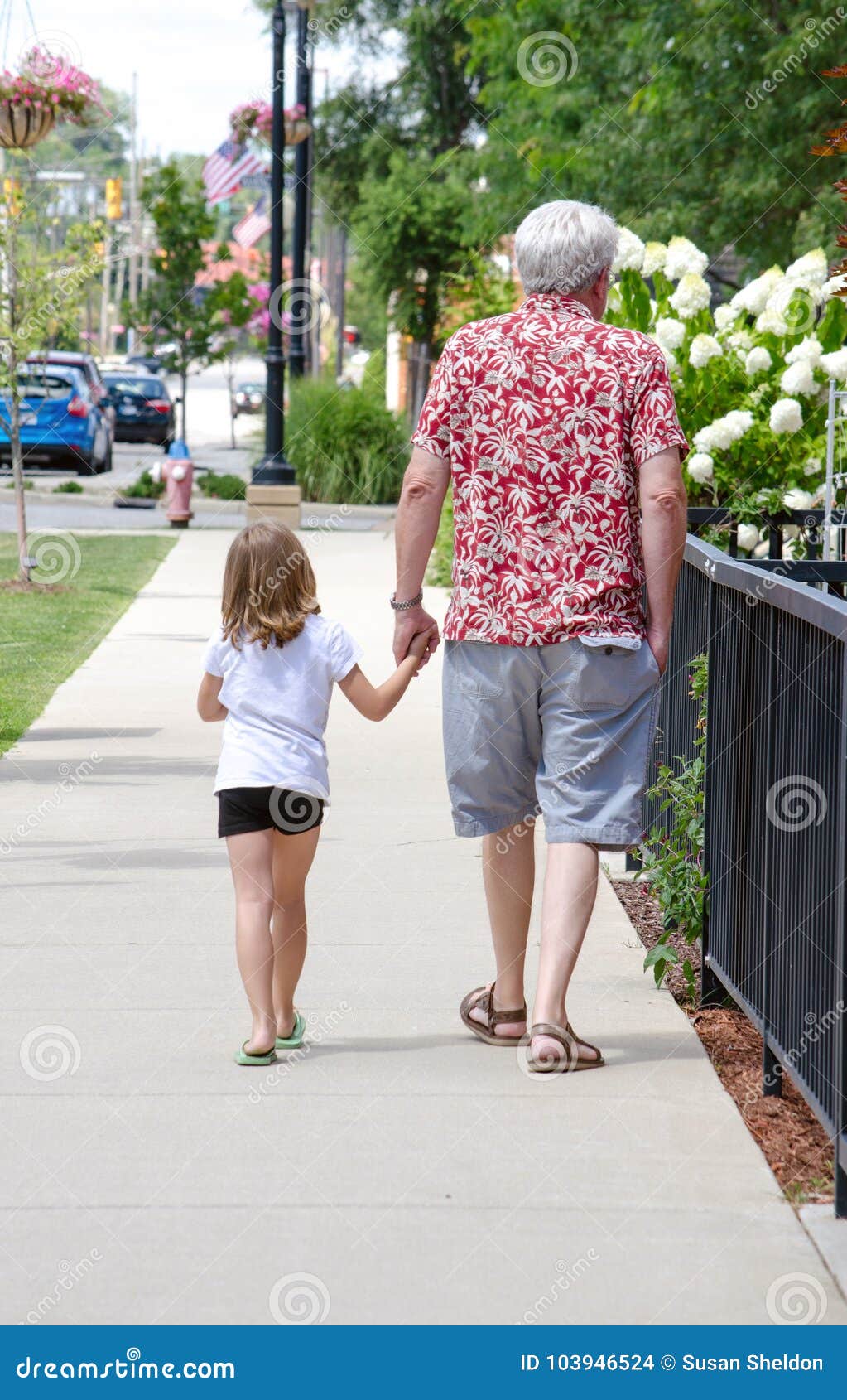 Grandpa Takes Off Wallpaper And Laughing With His Grandson Royalty Free 