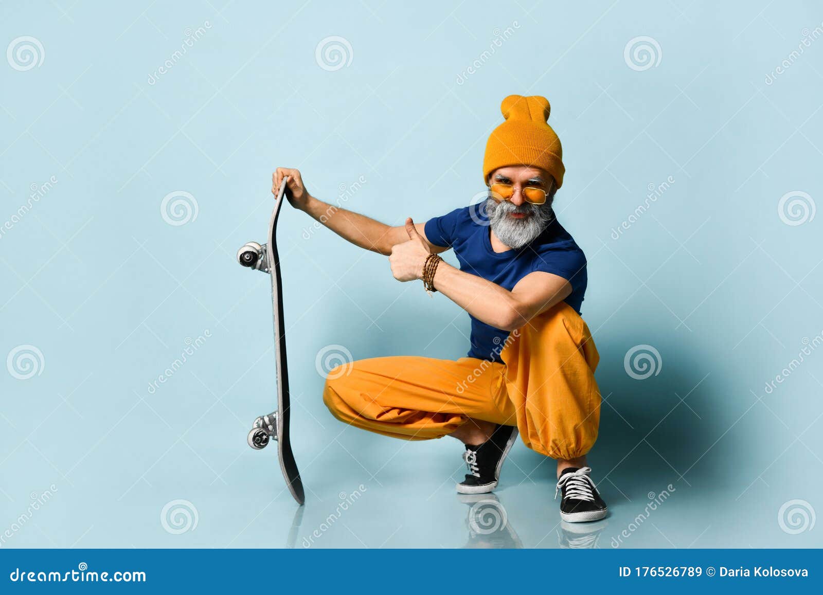 Grandpa in T-shirt, Sunglasses, Orange Pants, Hat, Gumshoes. Looking ...