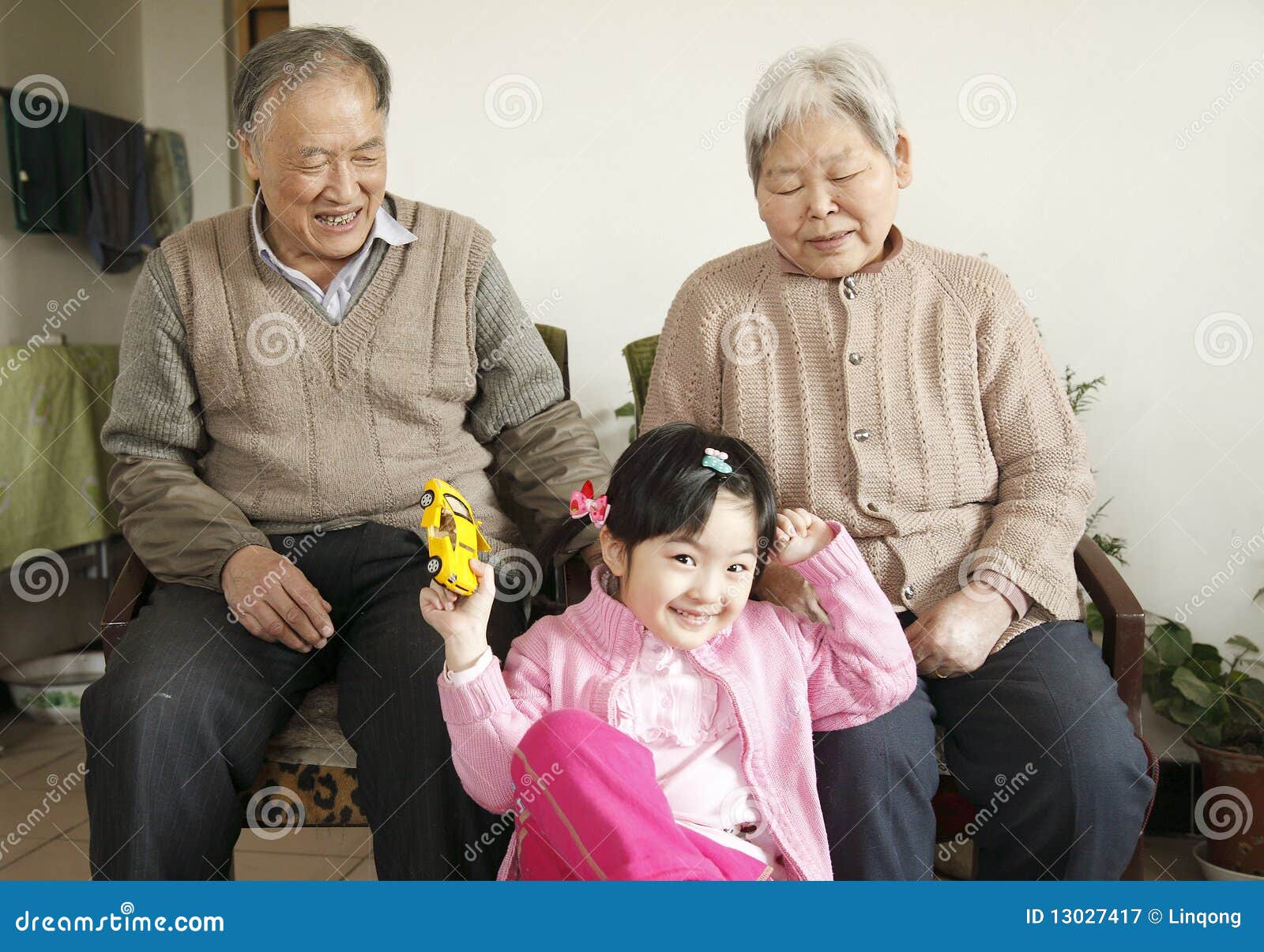 grandparents with granddaughter