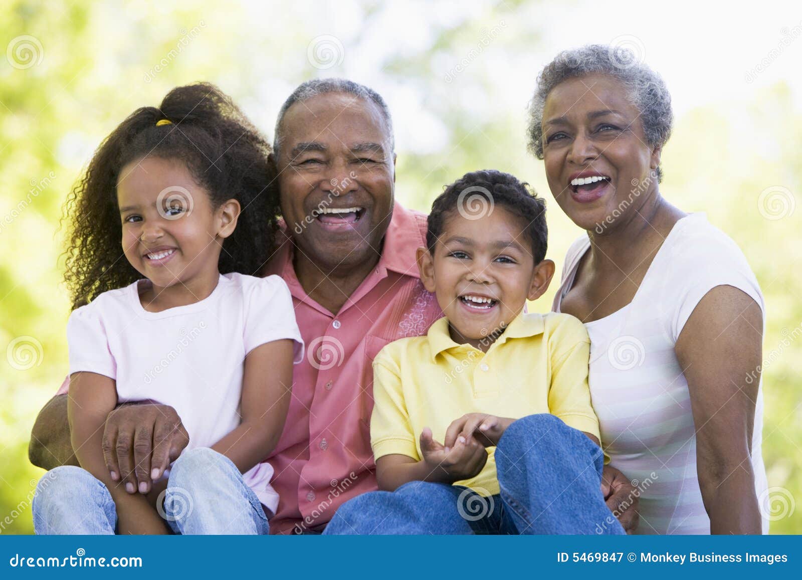 grandparents laughing with grandchildren