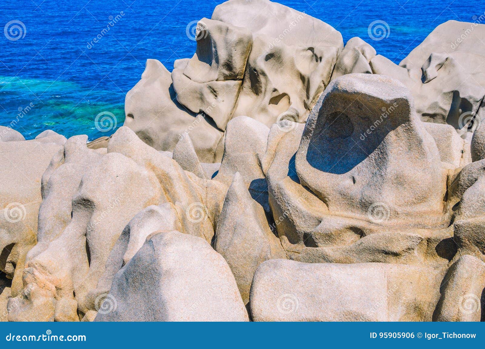 granite rocks on capo testa on sunny day near santa di gallura, sardinia, italy