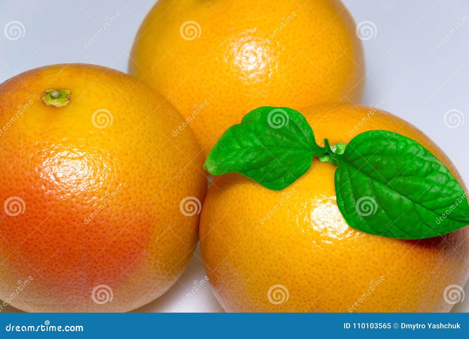 grapefruit with leaf  on white background. with clipping path