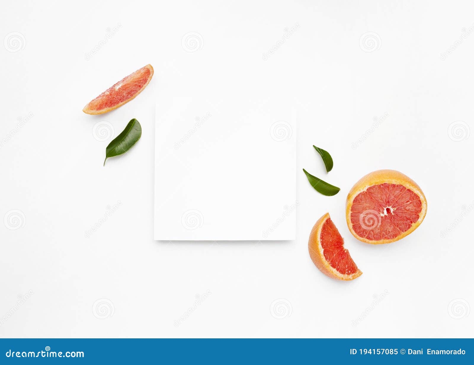Grapefruit and Slices with Leaves Isolated on White Background Stock