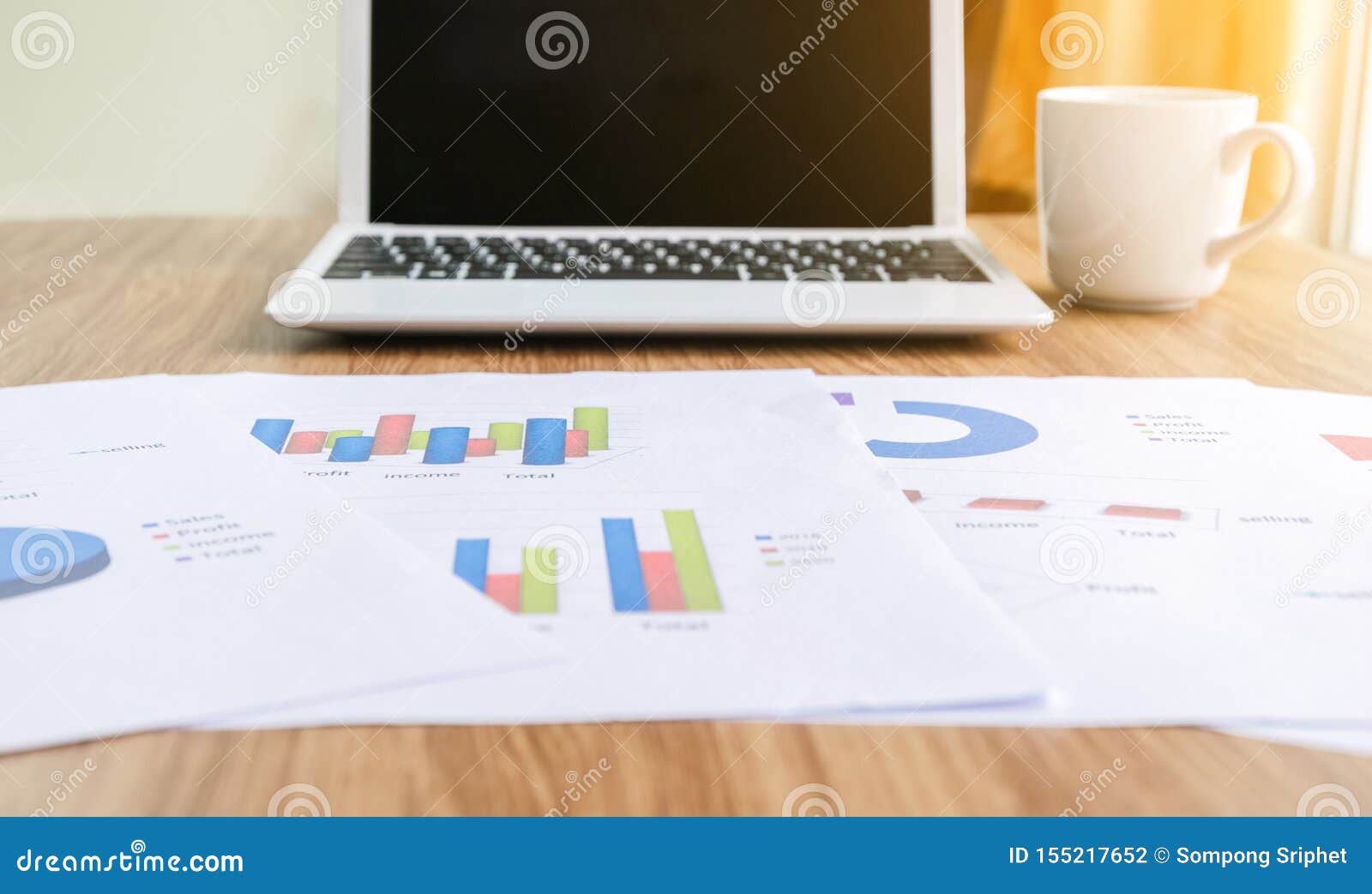 Graph on the Desk Analysis and Laptop with Business Stock Photo Image