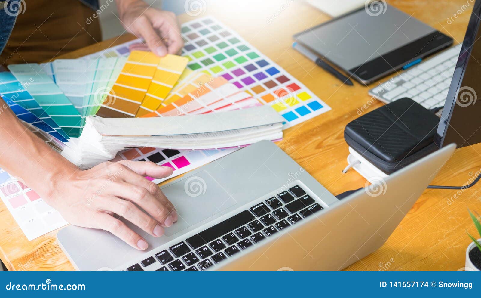 Graphic Designer Team Working On Web Design Using Color Swatches
