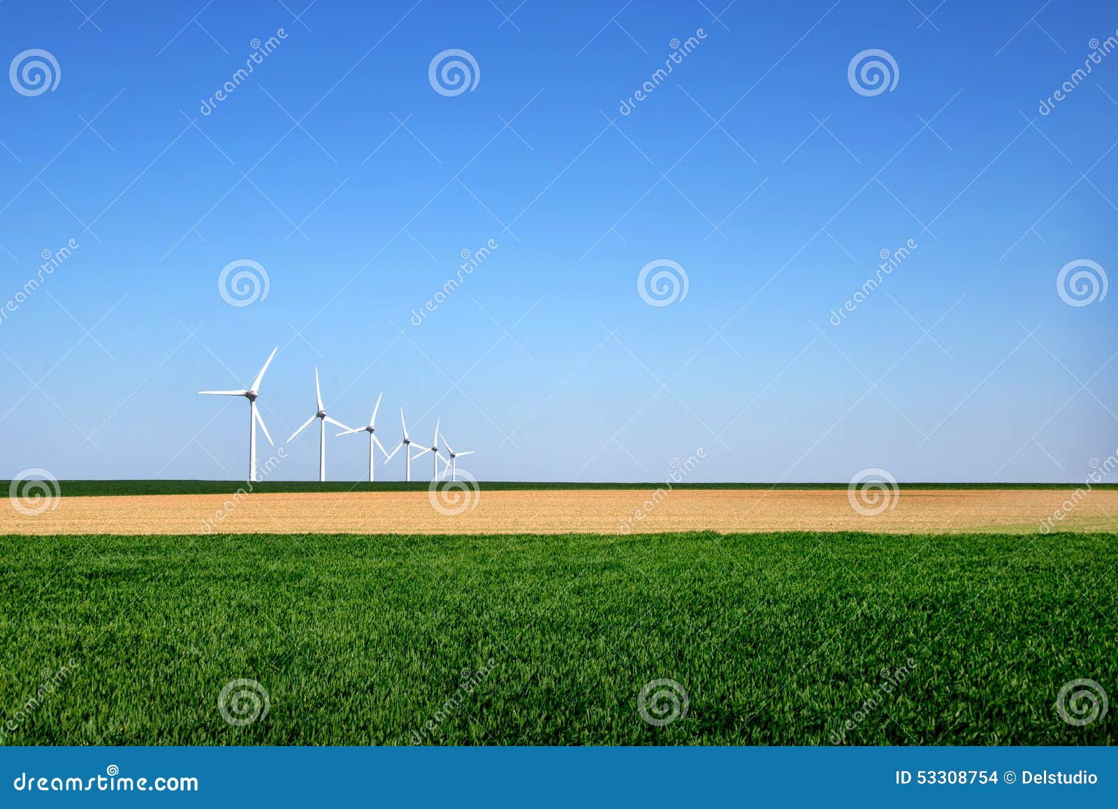graphic modern landscape of wind turbines aligned in a field