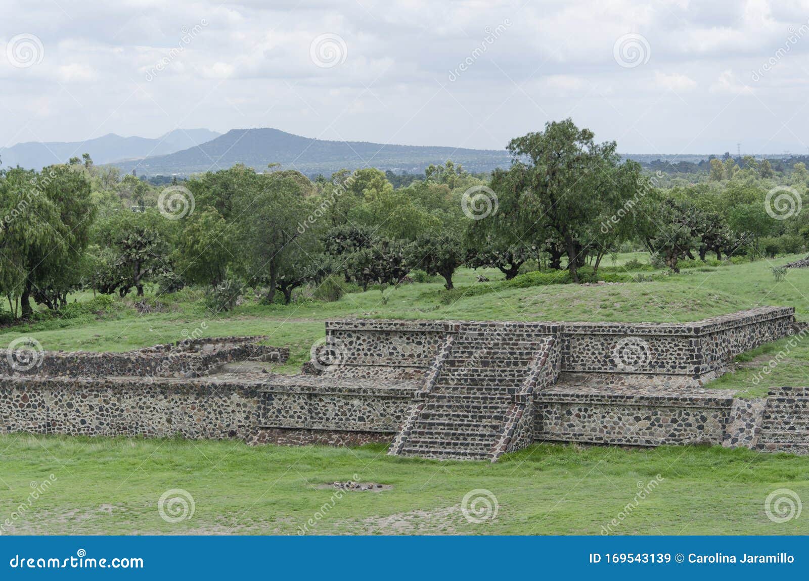 grass-covered pre-hispanic mesoamerican platforms in teotihuacan, mexico