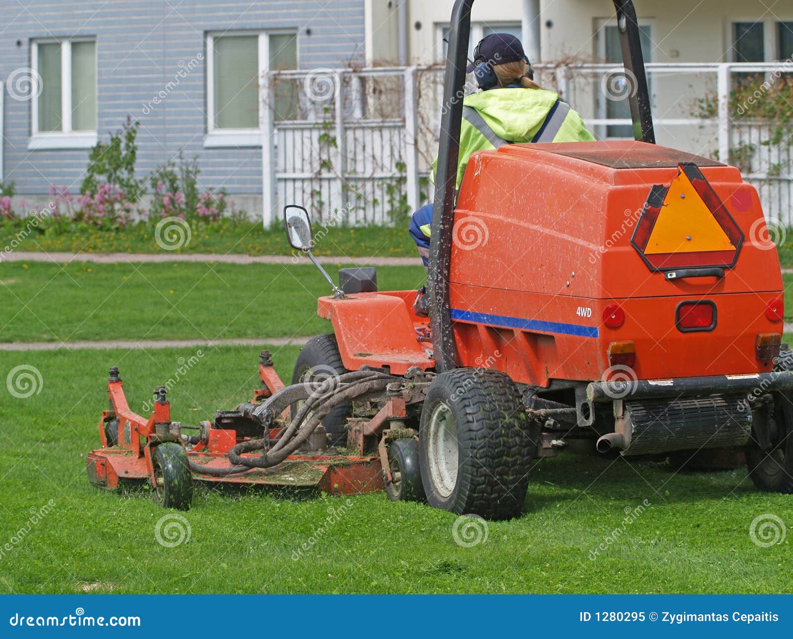 Grass cutting tractor stock image. Image of machinery 1280295