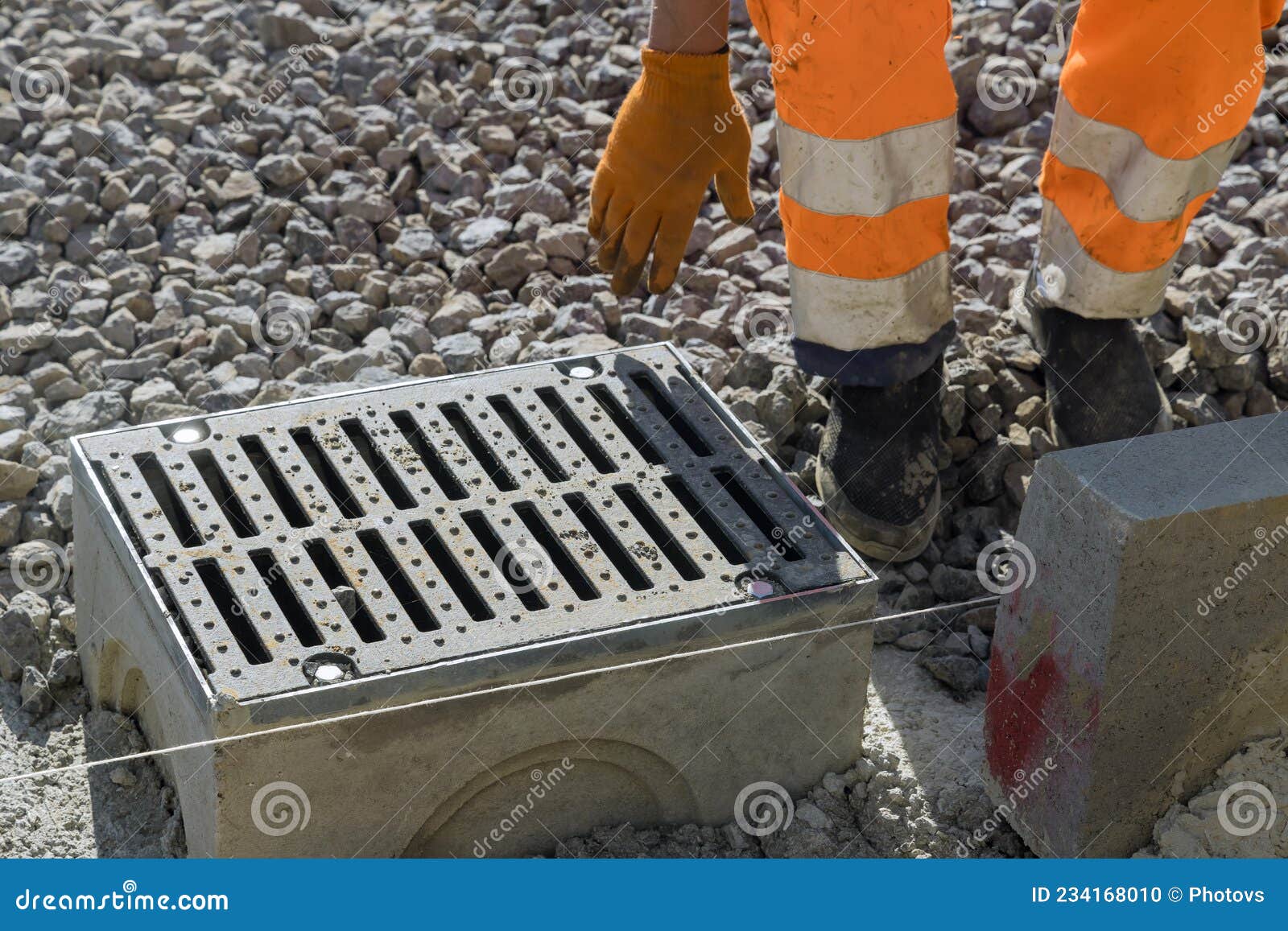 Grate on Well a Concrete Base during the Laying Water Drainage