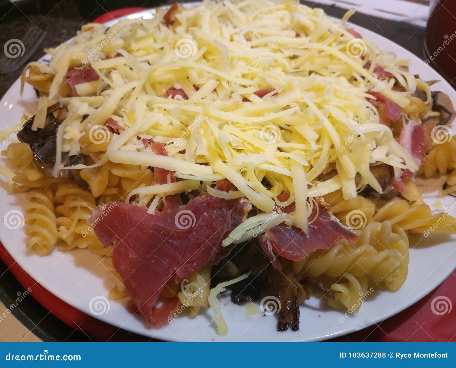 Grated Cheddar Cheese on Pasta Stock Photo Image of plate, cheddar