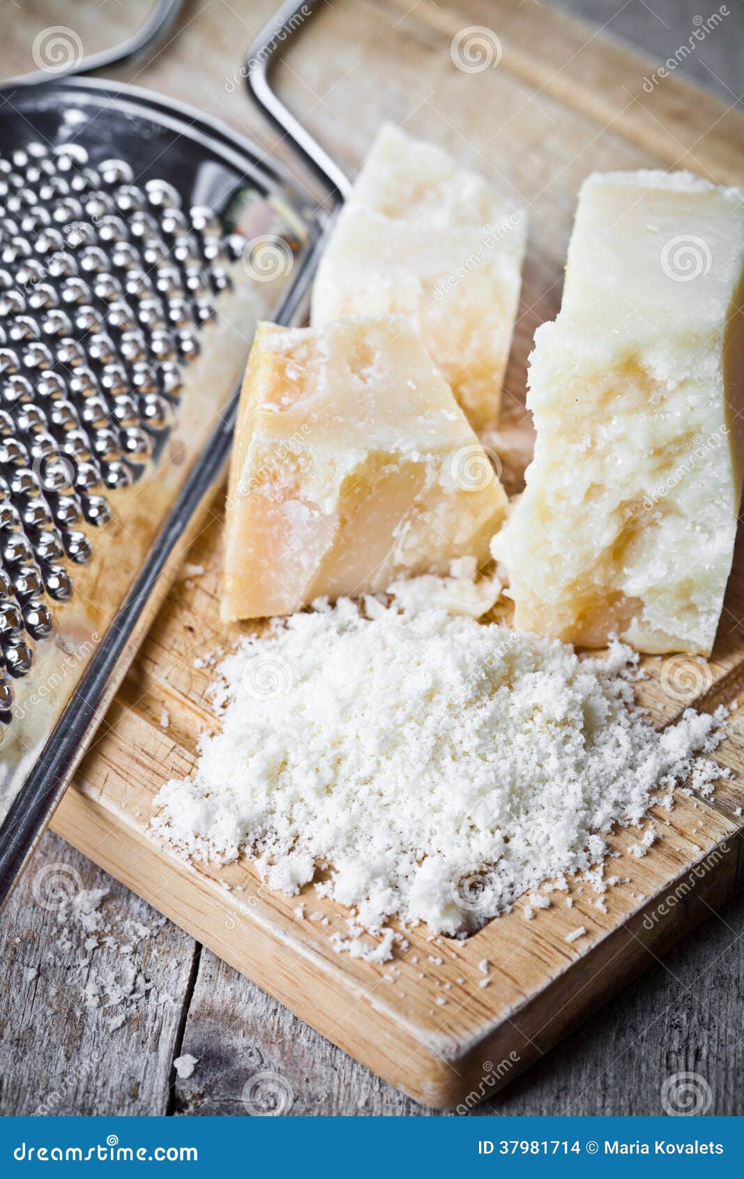 Grated Parmesan Cheese and Metal Grater Stock Photo Image of meal
