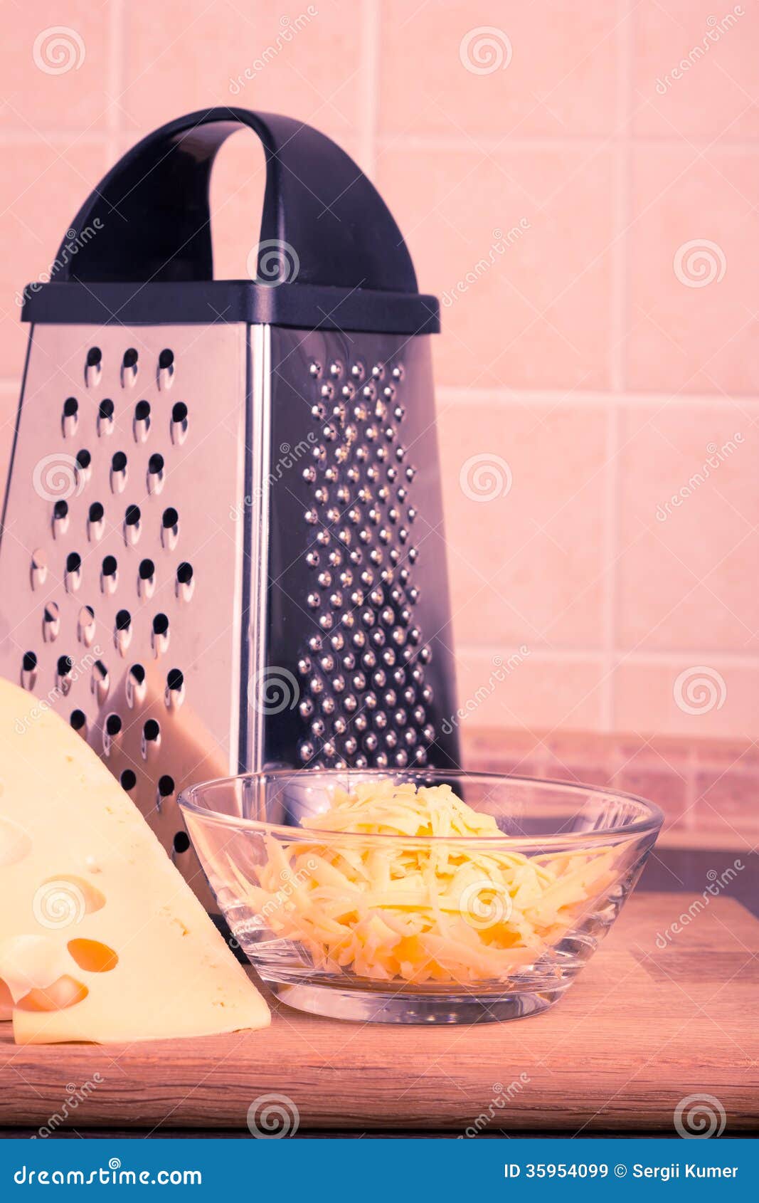 Grated Yellow Cheese with Grater at the Kitchen Stock Image Image of