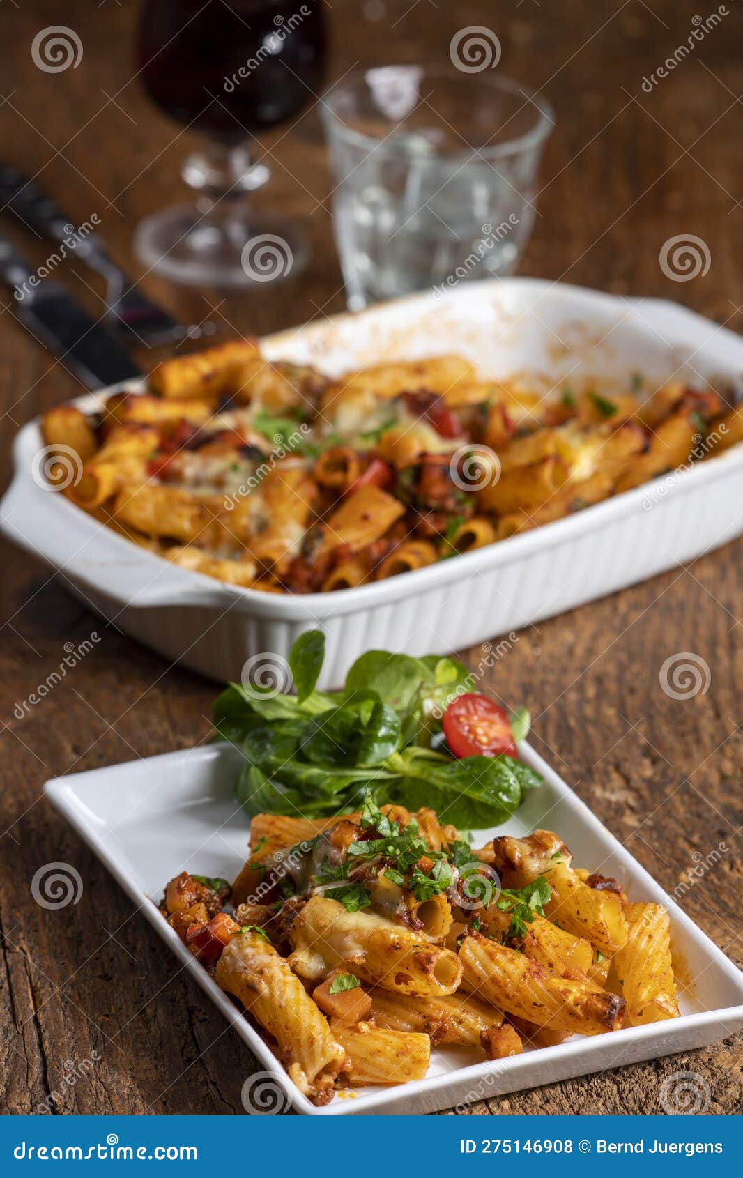 gratinated rigatoni pasta with sauce bolognaise