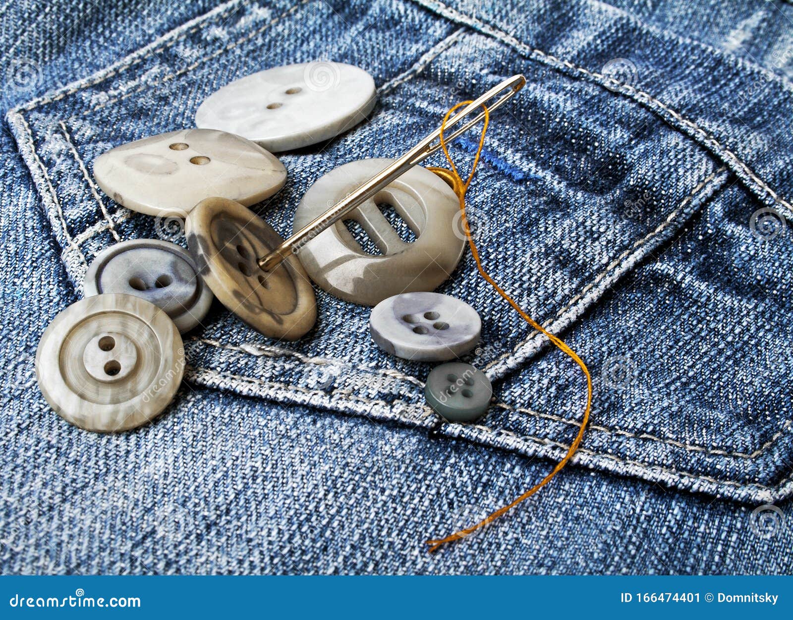 Gray Buttons with Needle on Denim Stock Image Image of craft, tailoring 166474401
