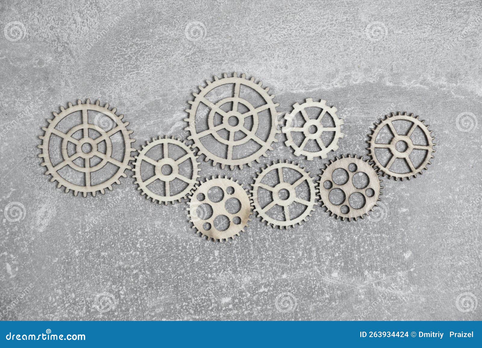 Gray Concrete Background with Gears and Copy Space. Stock Photo Image