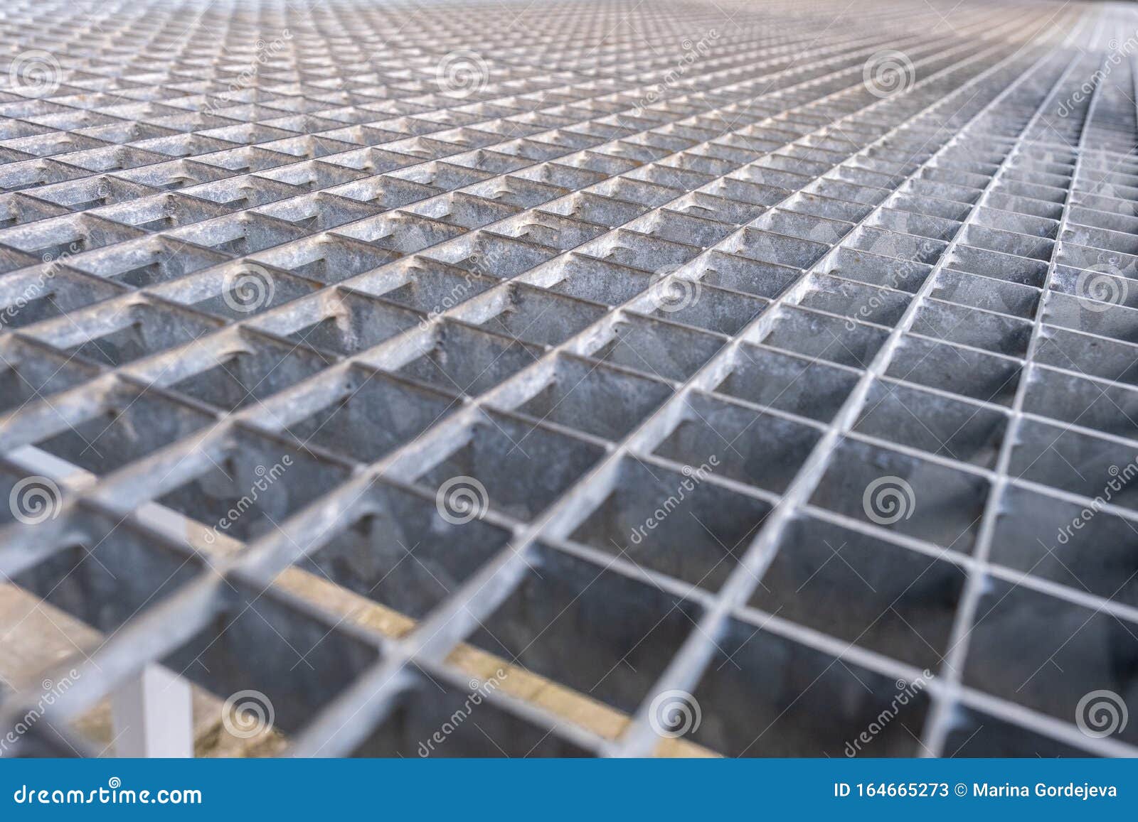 Gray Galvanized Iron Grate, Perspective View. Metal Flooring Stock