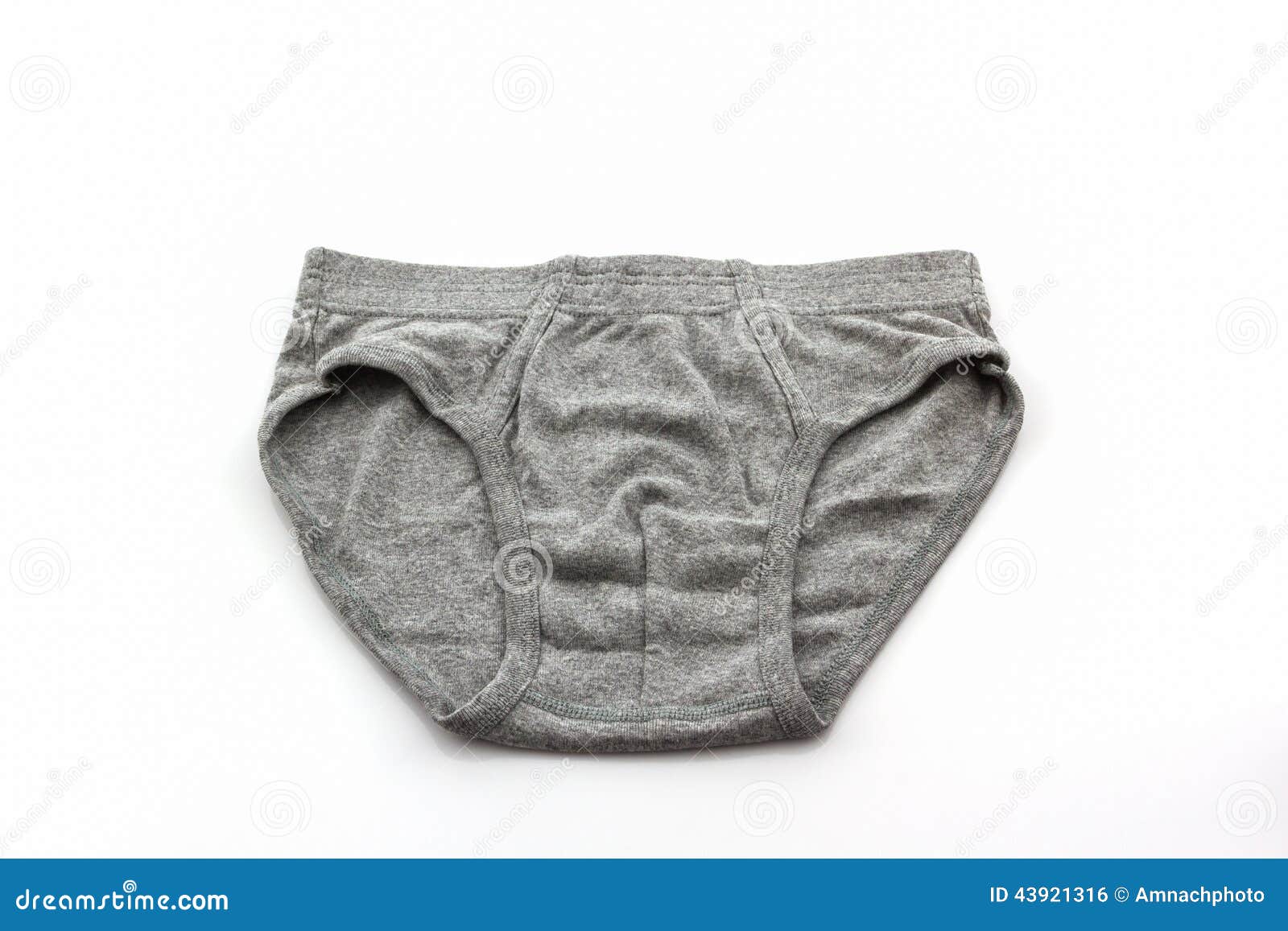 Man's hands hold gray underwear pants for men isolated on white