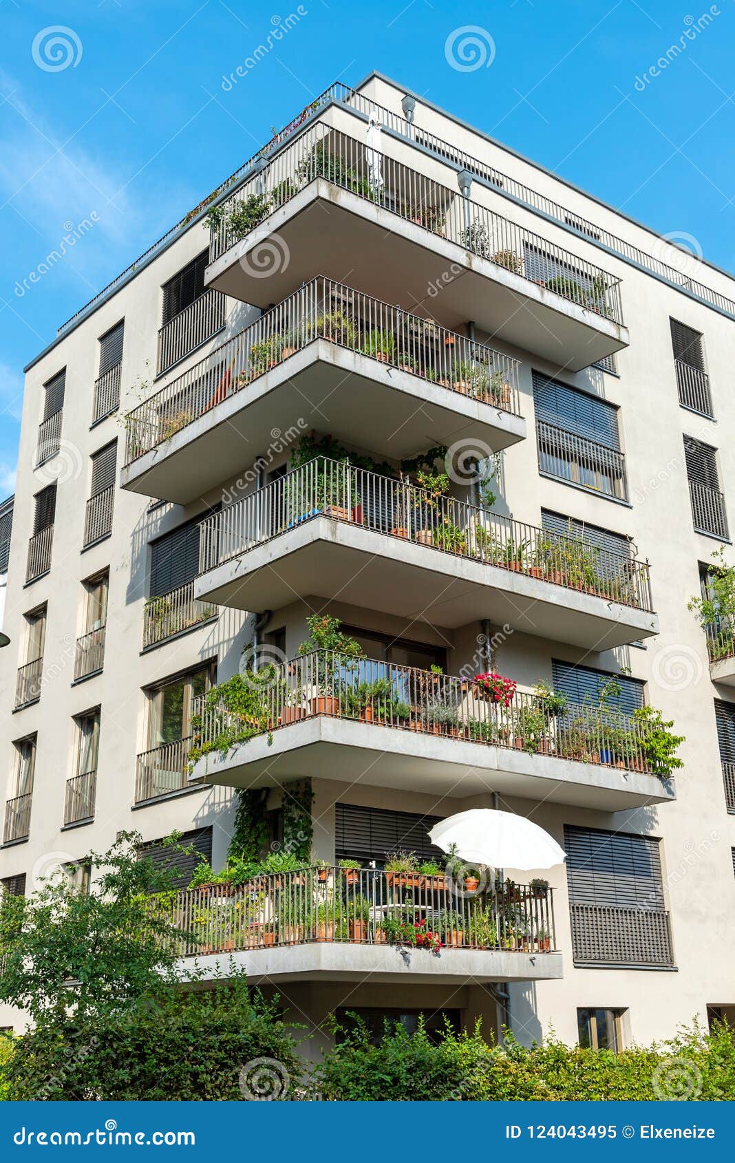 Gray Multi-family House with Balconies Stock Image - Image of condos
