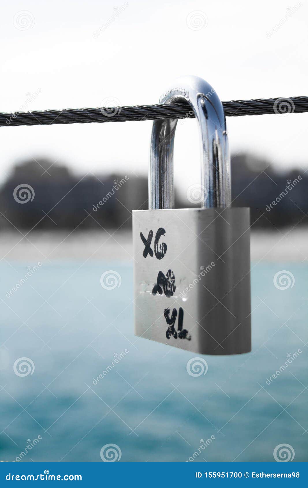 gray padlock closed on the rope