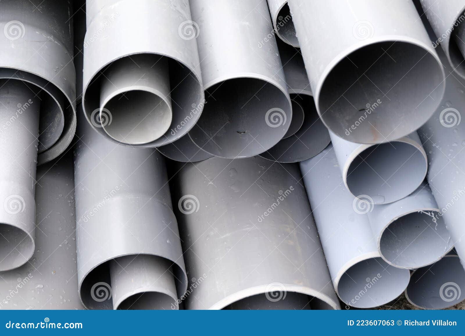 Gray Plastic Pipes of Different Sizes Stacked Stock Image Image of