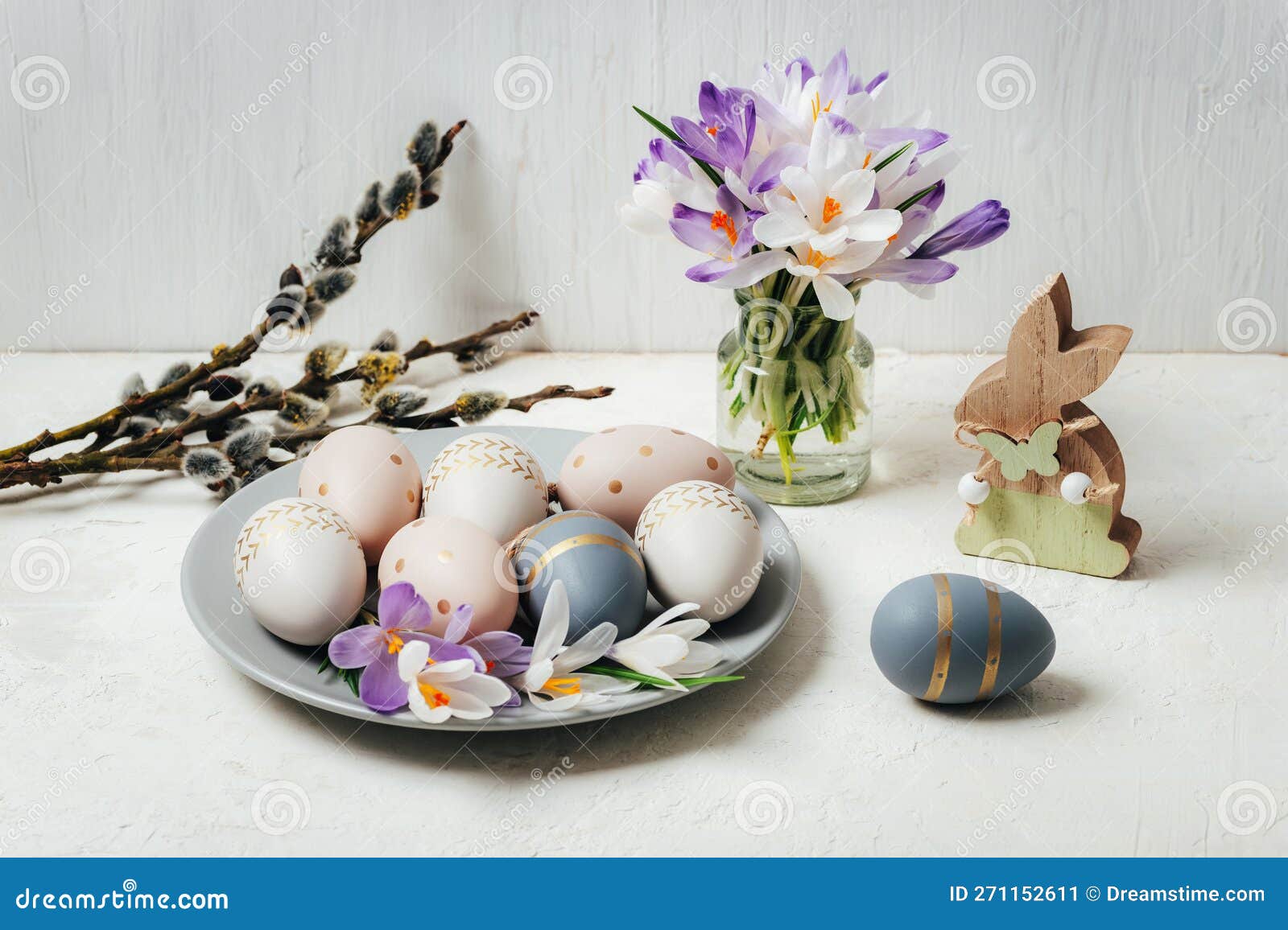 Gray Plate with Painted Easter Eggs and Wooden Toy Bunny, Crocus ...