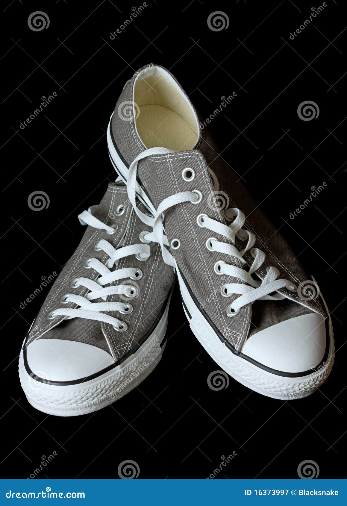 Gray Sneakers Youth Footwear at Black Background Stock Image - Image of ...