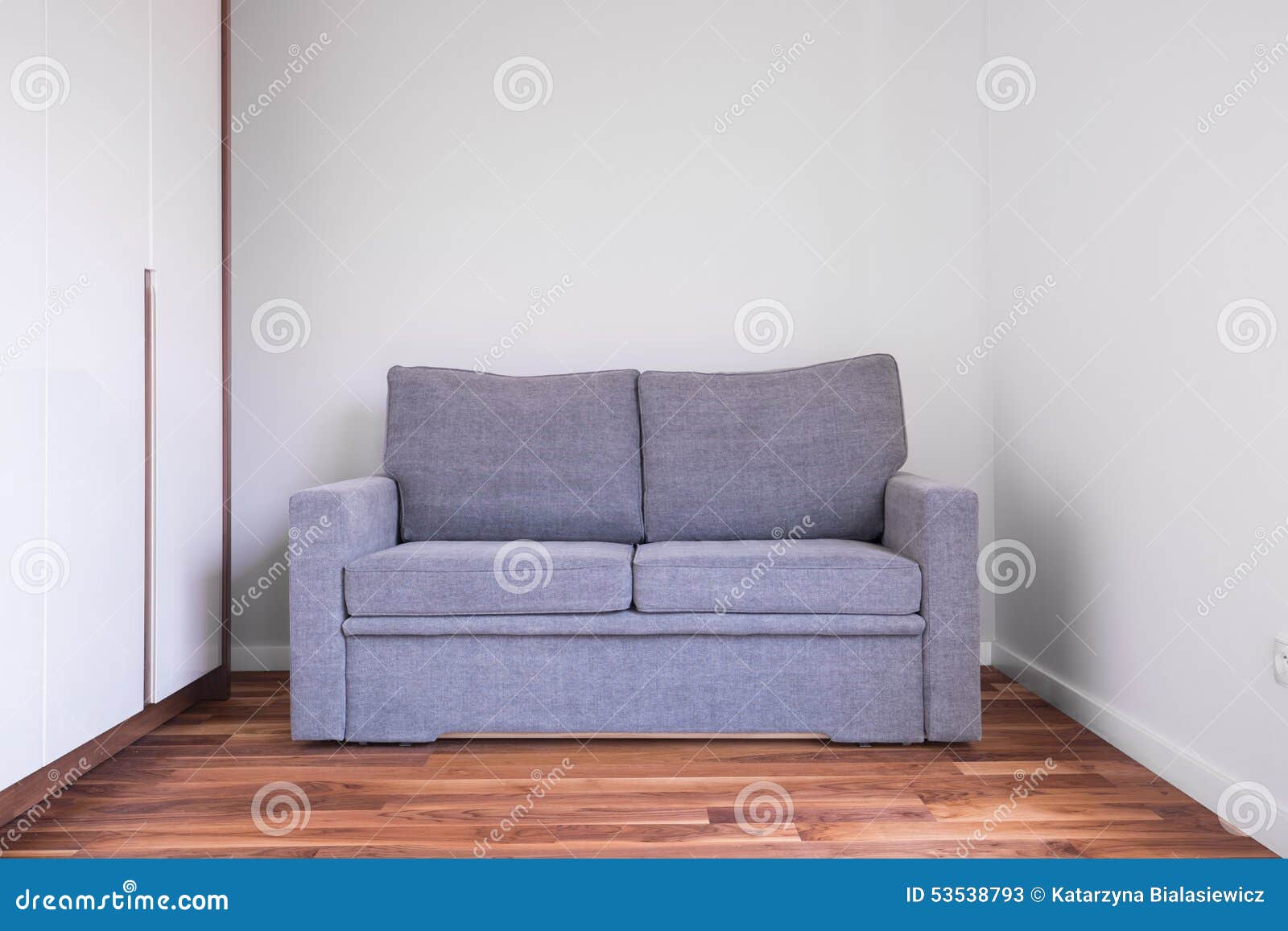 Gray sofa in empty room stock image. Image of apartment 53538793