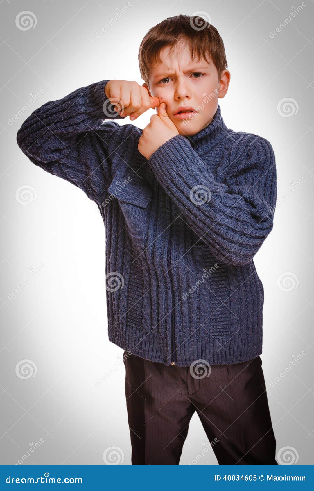 Gray Teen Boy Pushes Pimple Face On White Background St