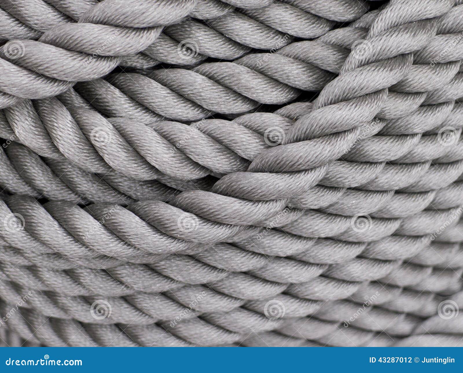 Thick Rope Fastened In The Knot Stock Photo, Picture and Royalty