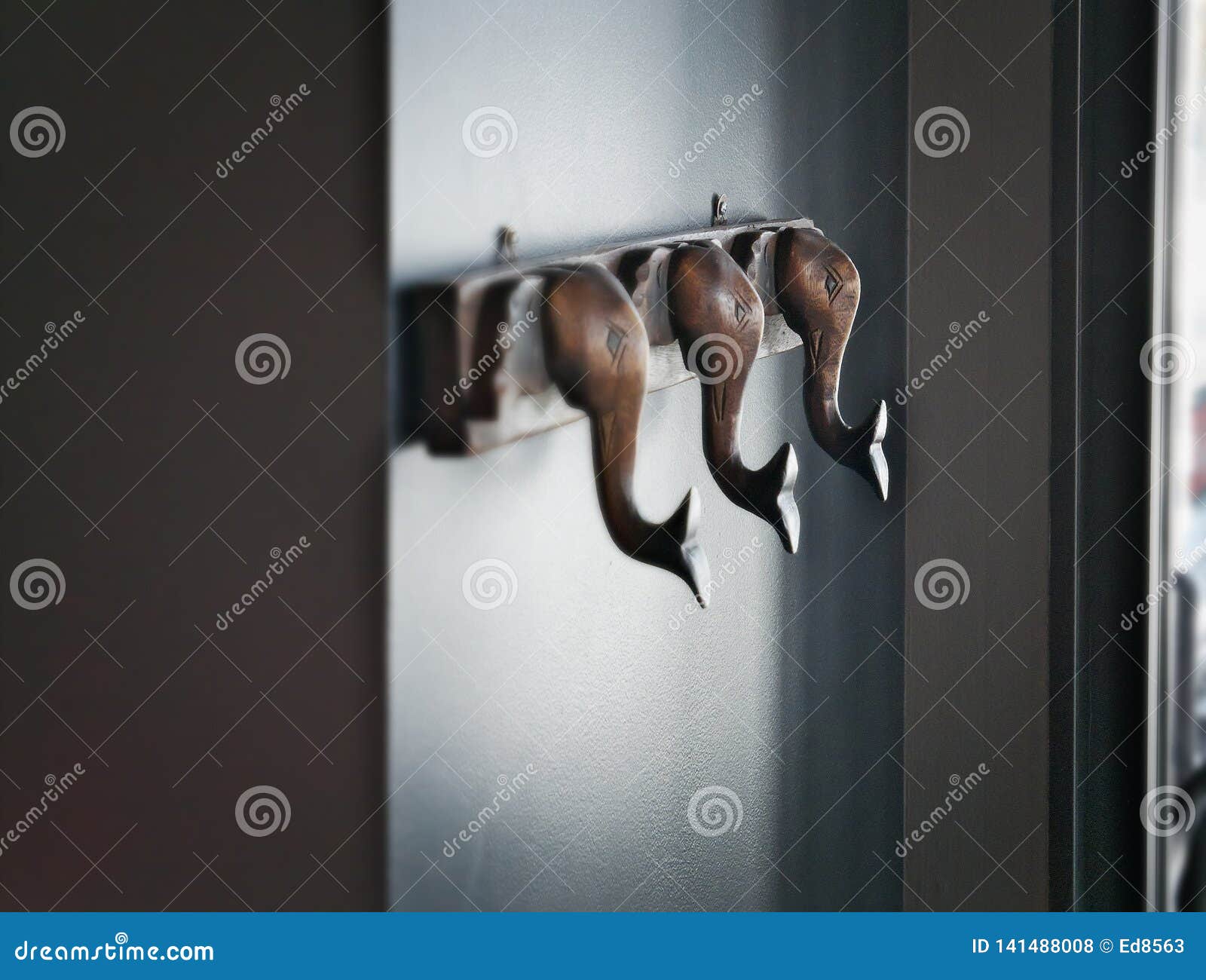 Gray Walls with Coat Hooks that are Backlit Stock Photo Image of