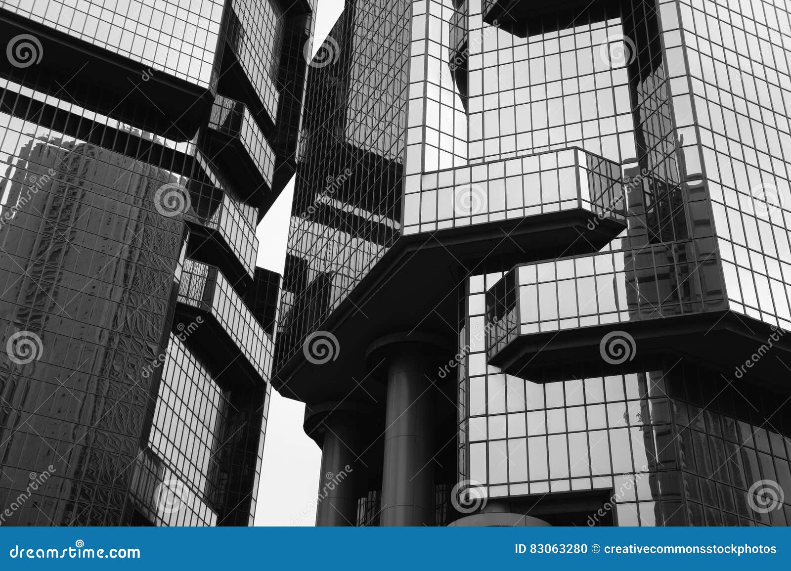 Grayscale photo of man standing near window photo – Free Cloud