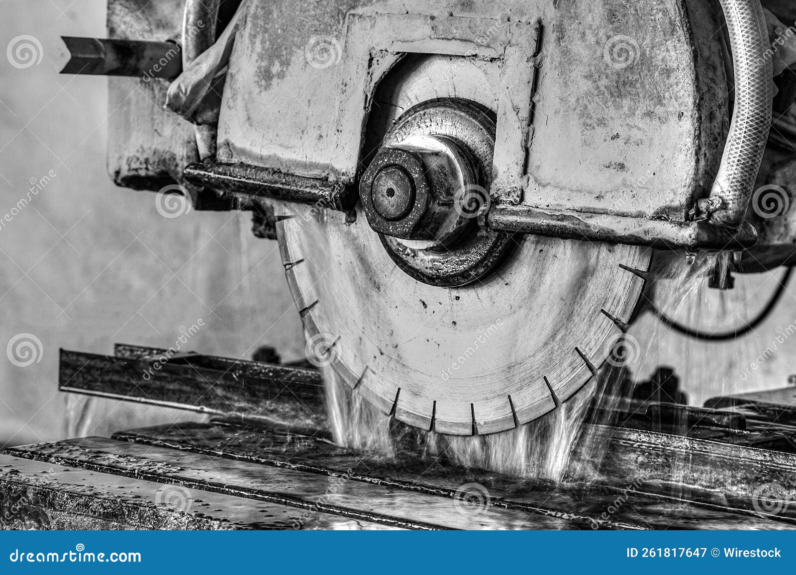 Grayscale of a Round Saw Cutting Marble in a Factory Stock Image