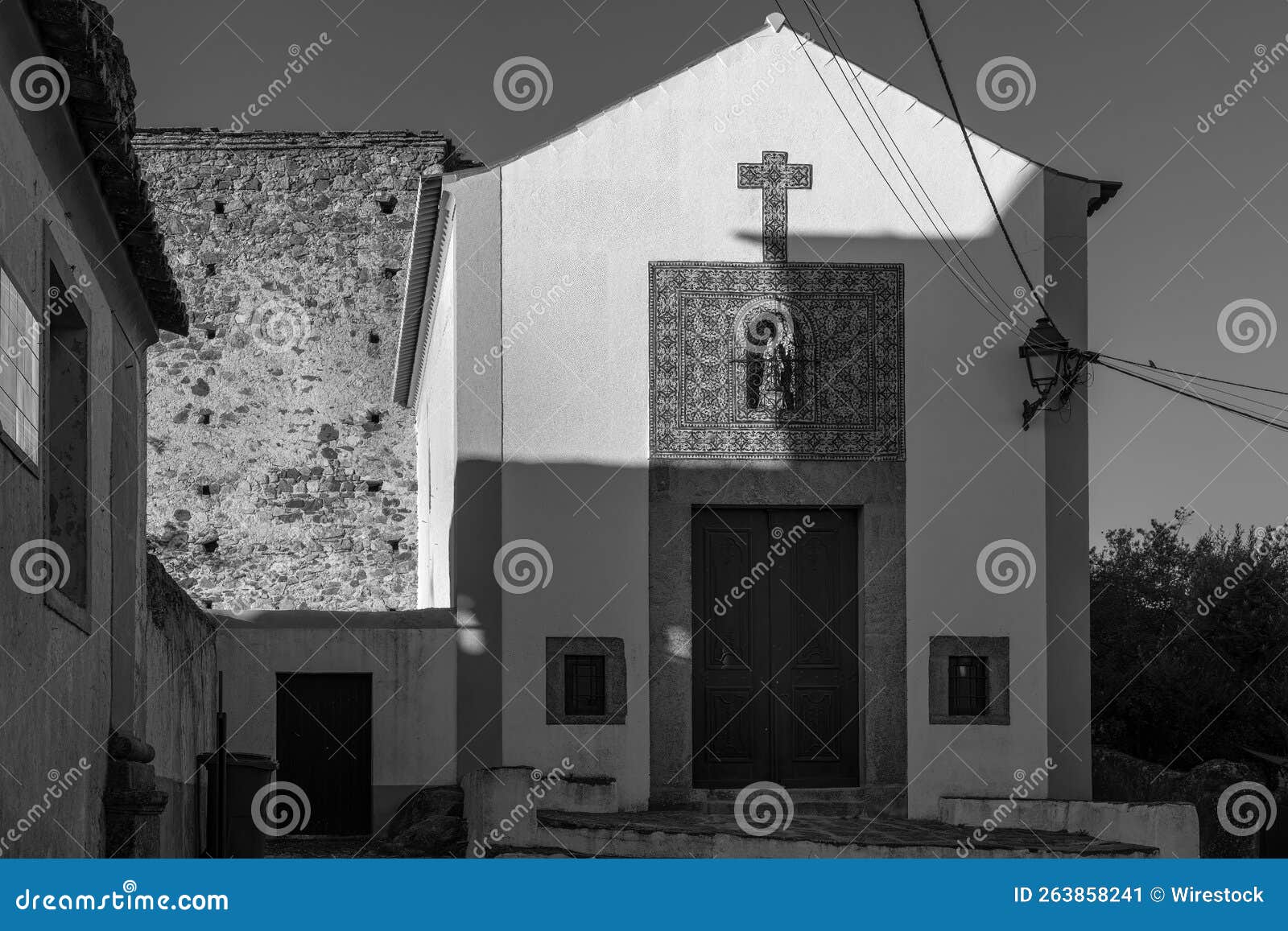 grayscale shot of the church of nossa senhora da alegria in castelo de vide, portugal