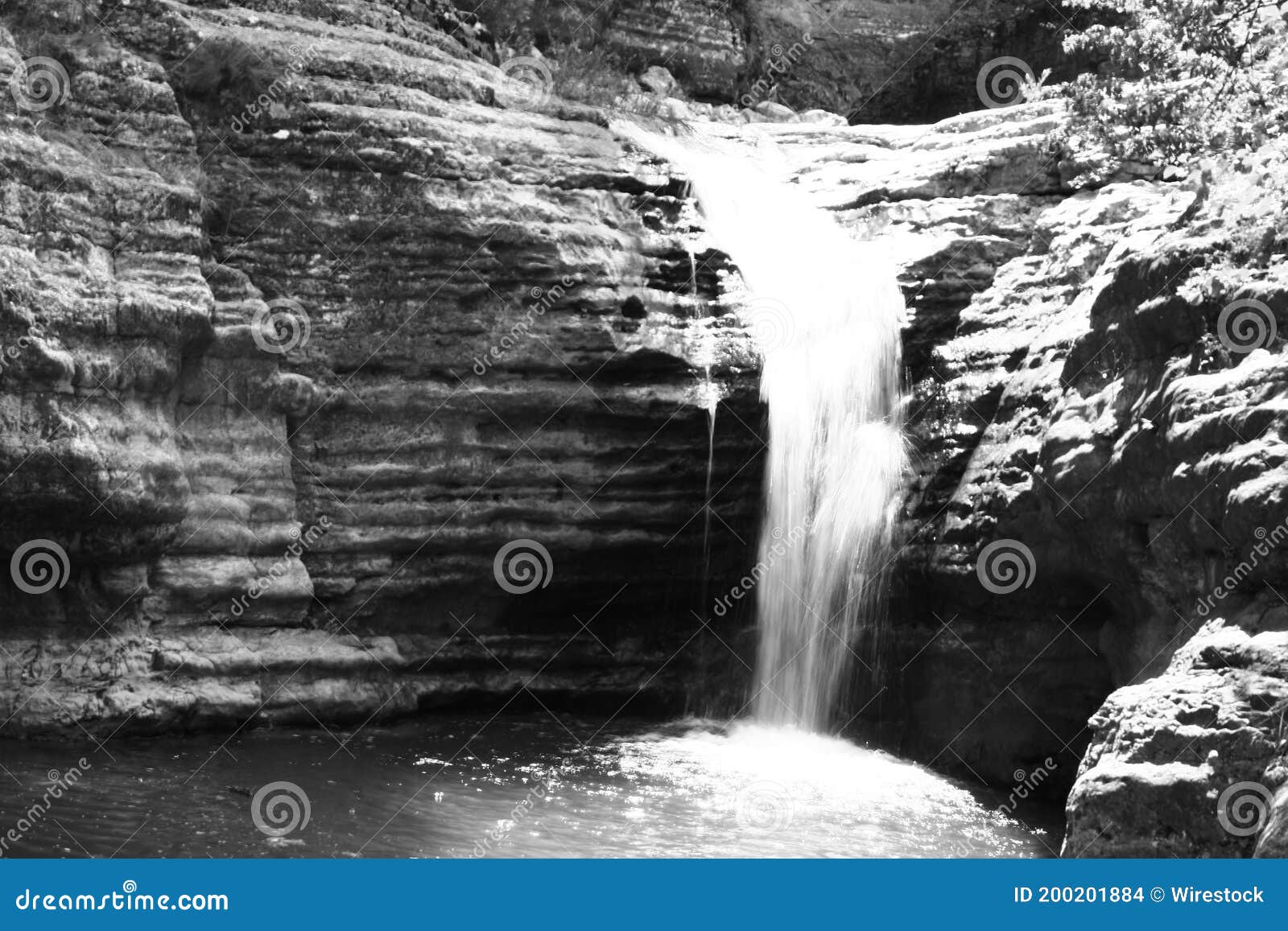 grayscale shot of a small waterfall in lastiver, armenia