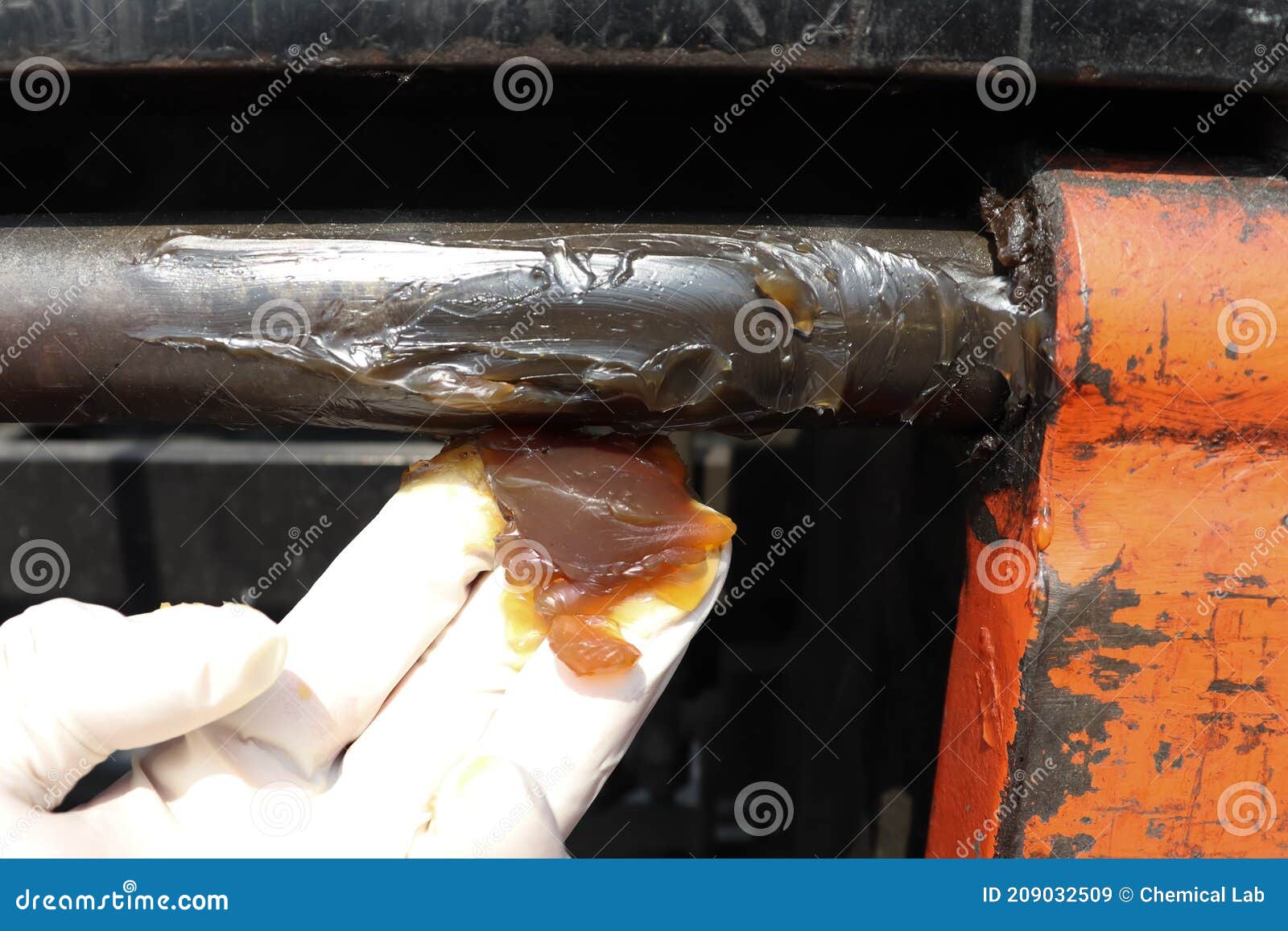 Grease used in industry stock image. Image of glove 209032509