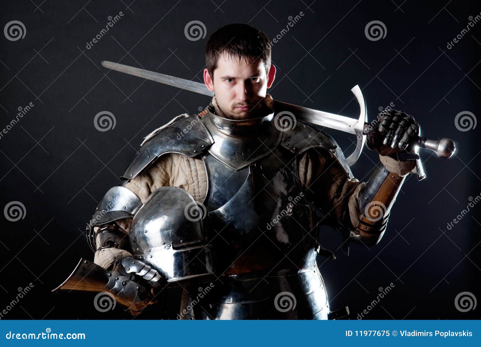 Great Knight Holding His Sword And Helmet Royalty Free Stock Photo