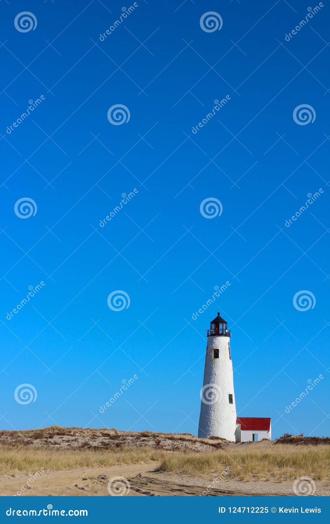 Great Point Light Lighthouse Nantucket with Blue Sky, Beach Grass and